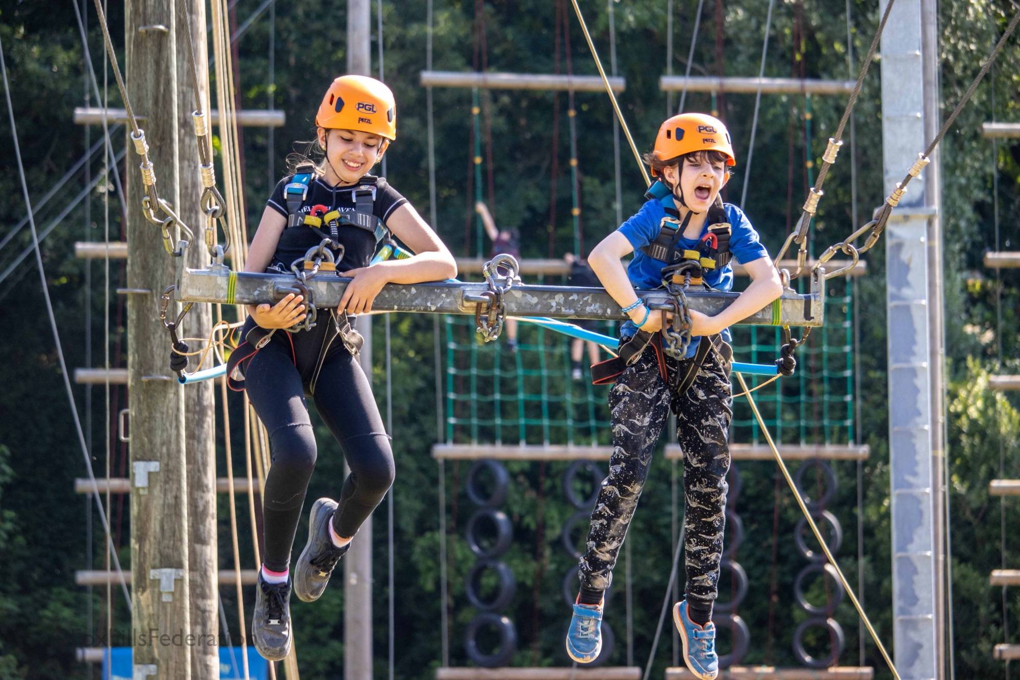 Children scream on the giant swing